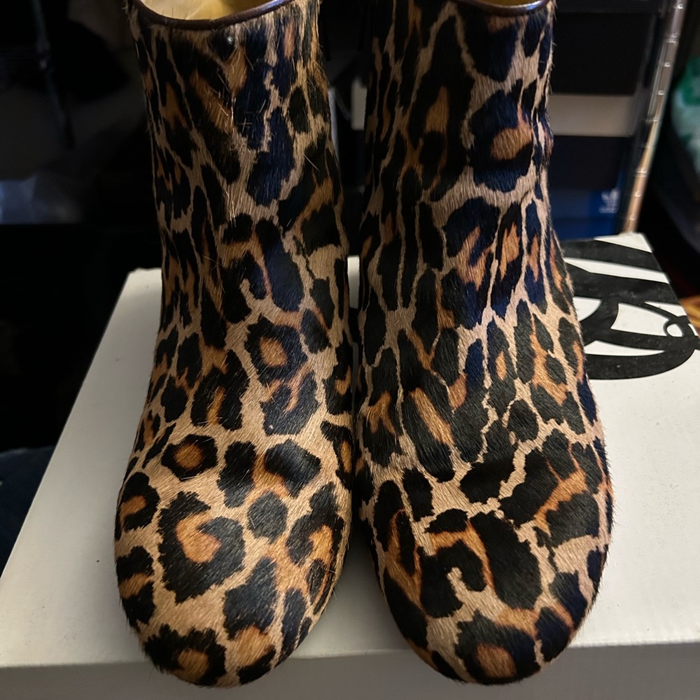 Pony hair leopard wedge booties.